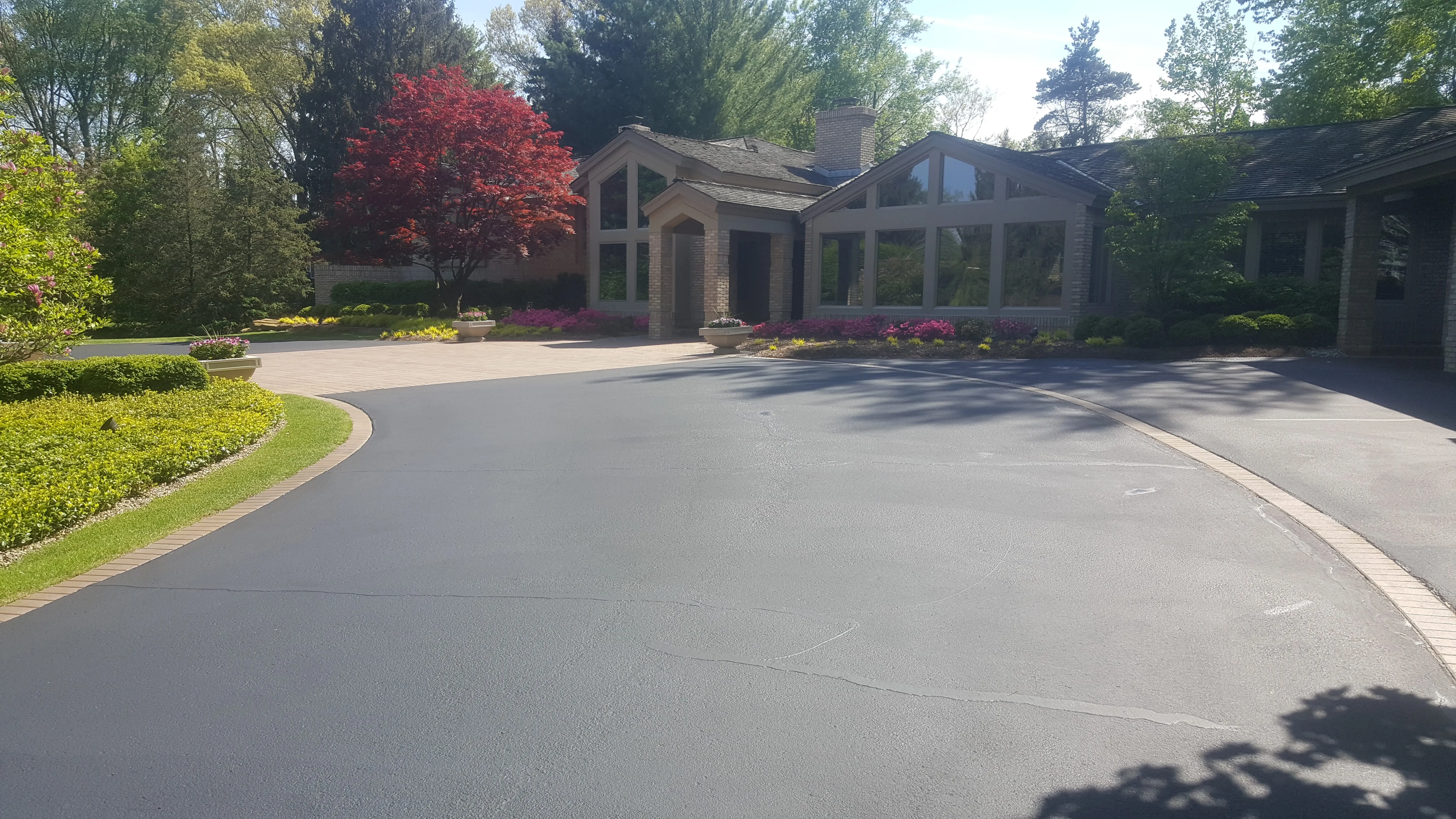 Freshly sealed driveway at a residential property